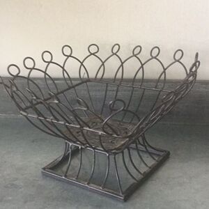 Metal basket with base and rosette decor organization